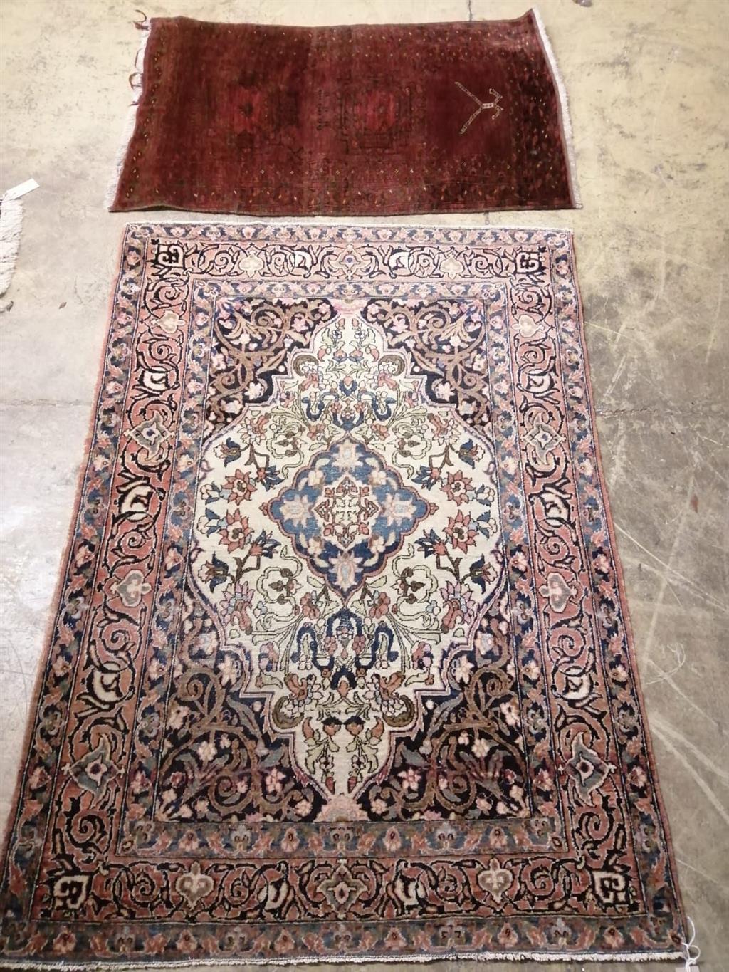 A Persian cream ground rug and a Bokhara style prayer rug, larger 144 x 100cm